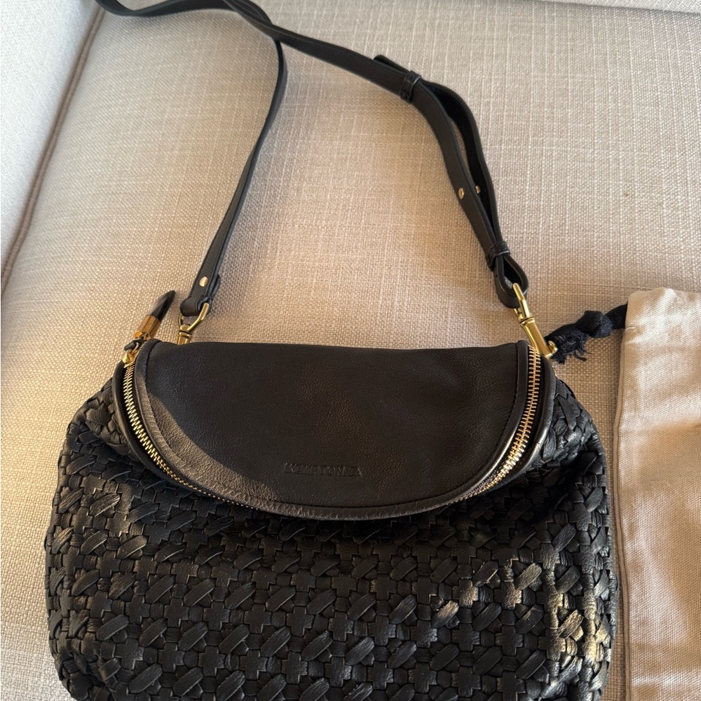 Elegant Black Crossbody Bag with Gold Accents